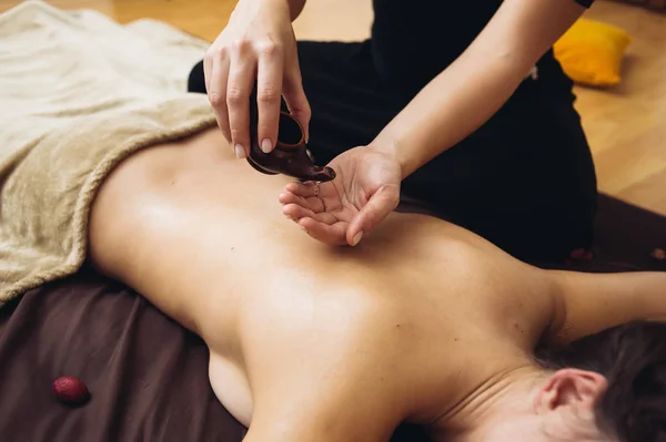 depositphotos_315085752-stock-photo-aromatherapy-massage-massage-therapy-using